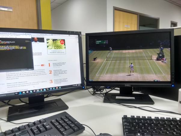Watching a tennis match from the work desk